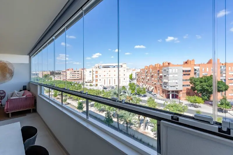 Cortinas cristal plegables terraza &aacute;tico Barcelona &mdash; Cristaler&iacute;a Barcelona